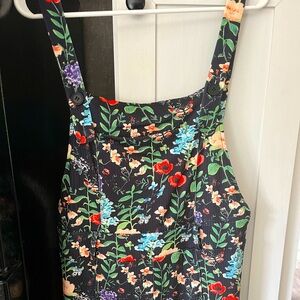 Square neck floral wide leg jumpsuit with front pocket!